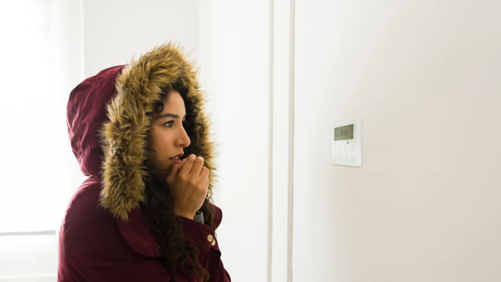 Home heating insulation thermostat